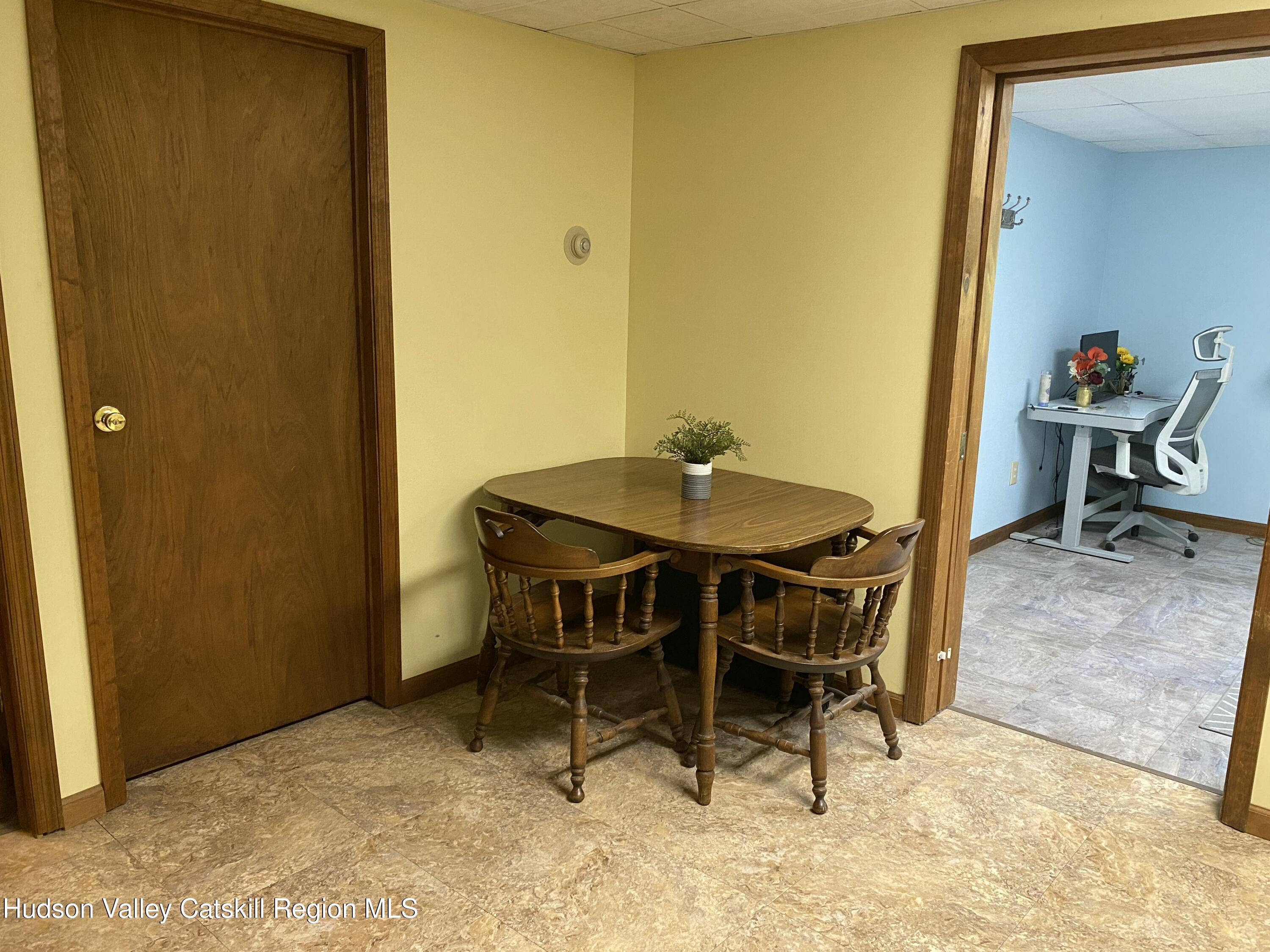 22 Beacham Road Rhinebeck, NY 12572 - Photo 34 of 38 a view of a dining room with a table and chairs in it