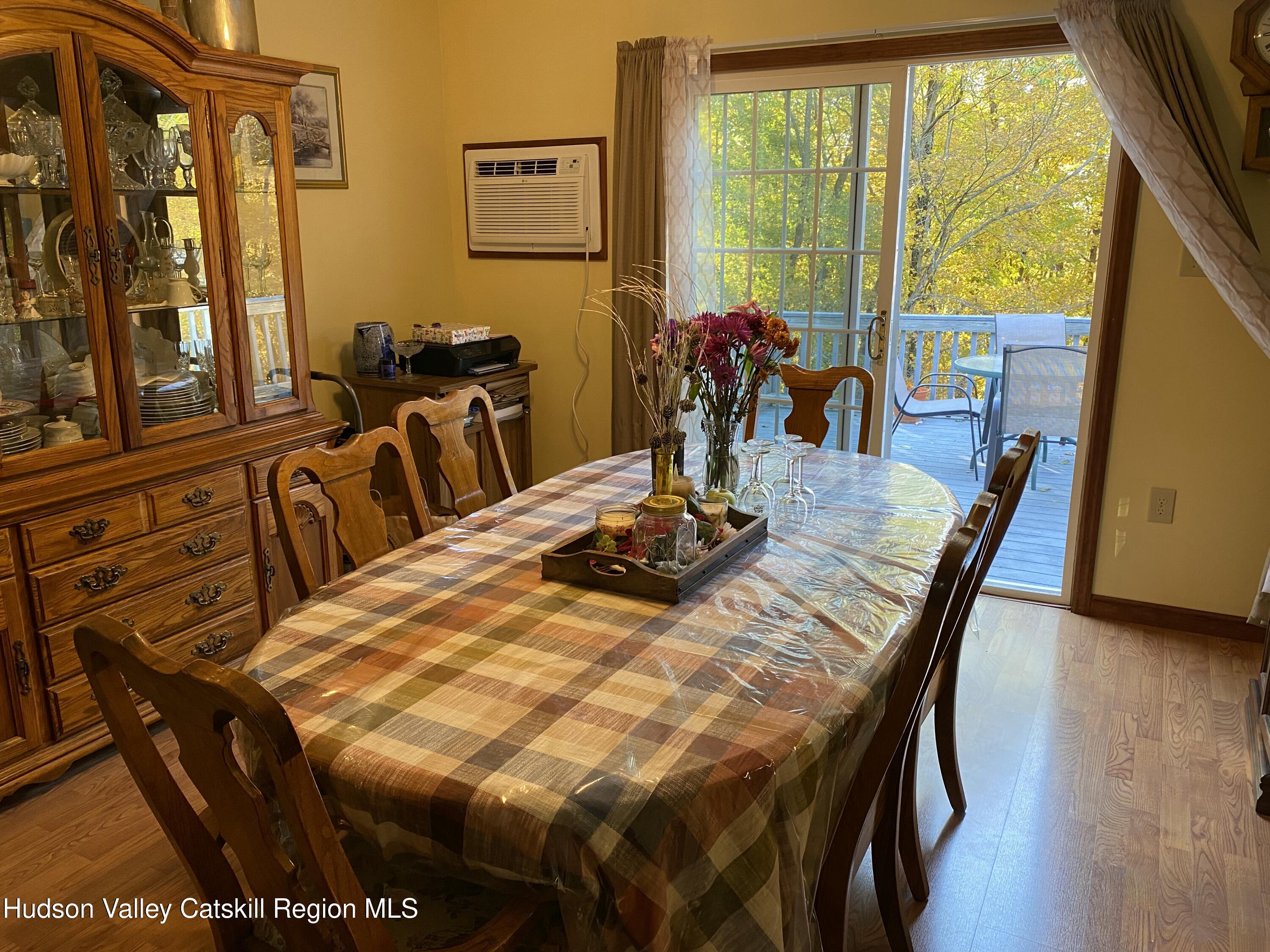 22 Beacham Road Rhinebeck, NY 12572 - Photo 7 of 38 DINING ROOM FACING SLIDERS