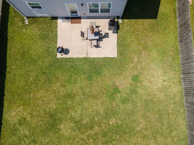 a view of a outdoor space with swimming pool