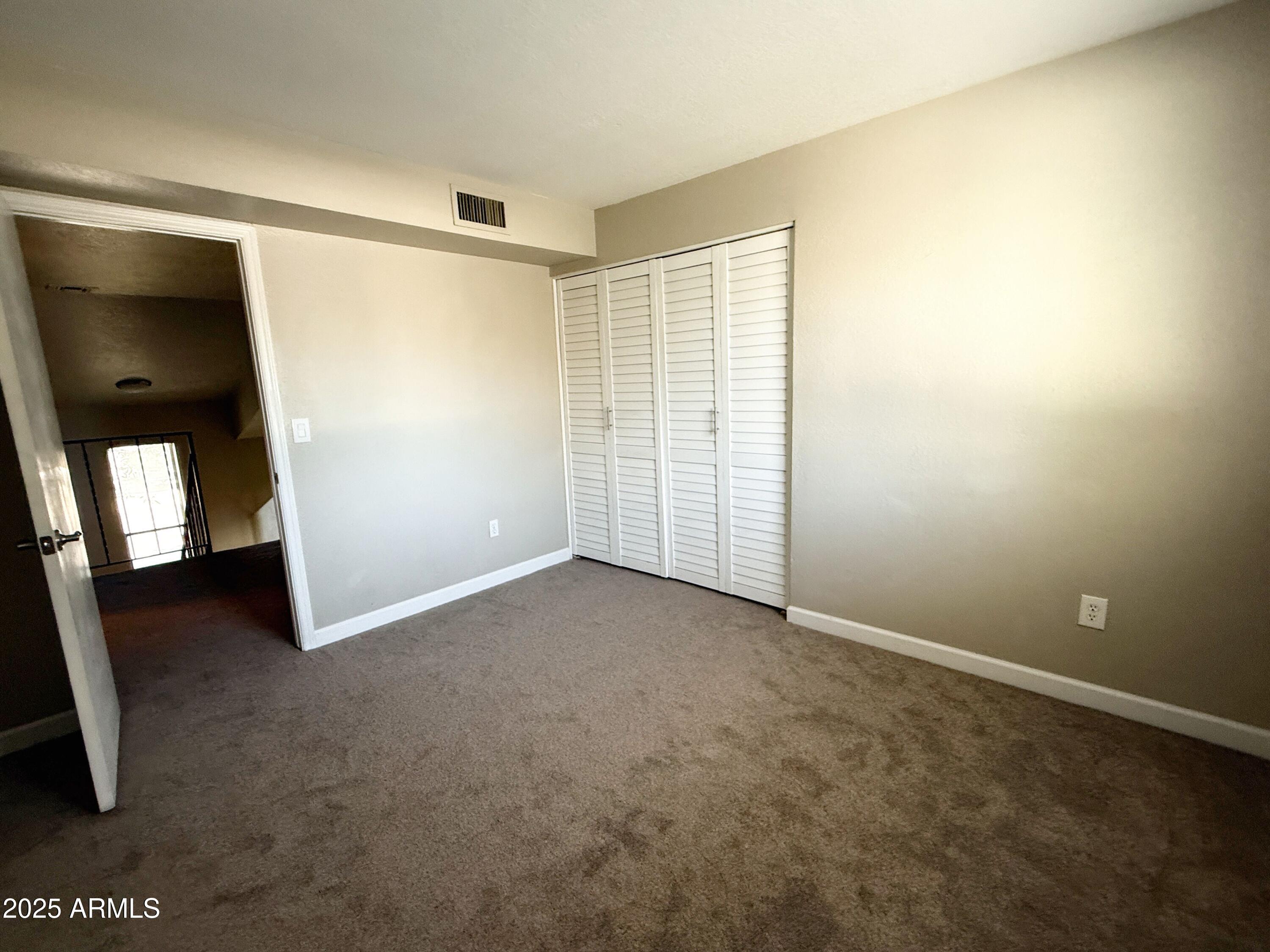 1529 East Edgewater Drive Tempe, AZ 85283 - Photo 20 of 34 an empty room with a bathroom