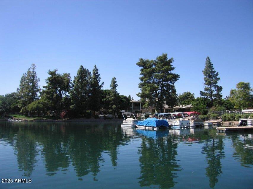 1529 East Edgewater Drive Tempe, AZ 85283 - Photo 30 of 34 a view of a lake with houses