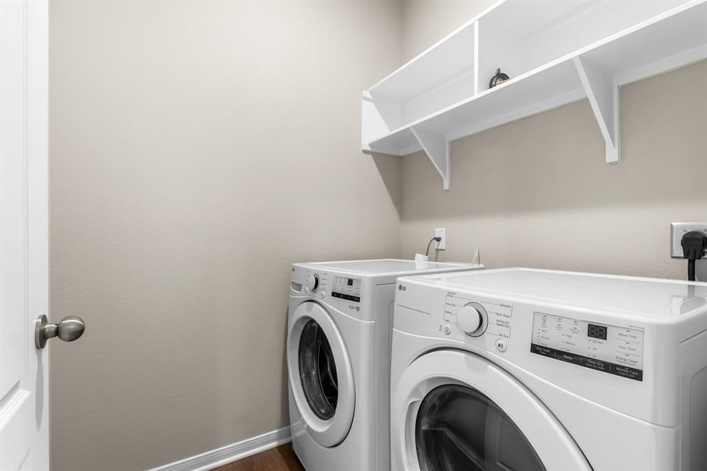 11233 Solar Street Lorena, TX 76655 - Photo 21 of 33 laundry room with space for full size washer + dryer and storage