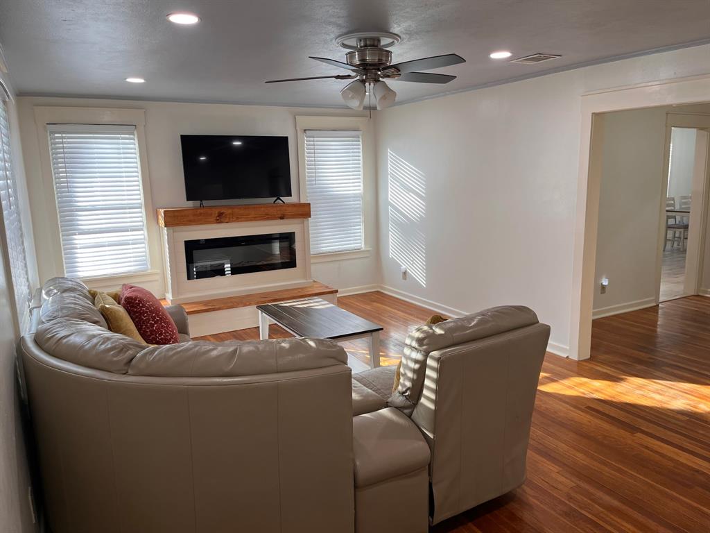 2802 Westover Road Shreveport, LA 71108 - Photo 15 of 33 a living room with furniture and a fireplace