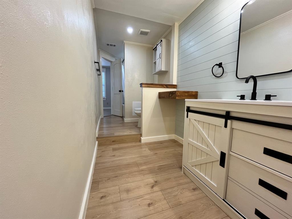 2802 Westover Road Shreveport, LA 71108 - Photo 19 of 33 a kitchen with a sink and cabinets