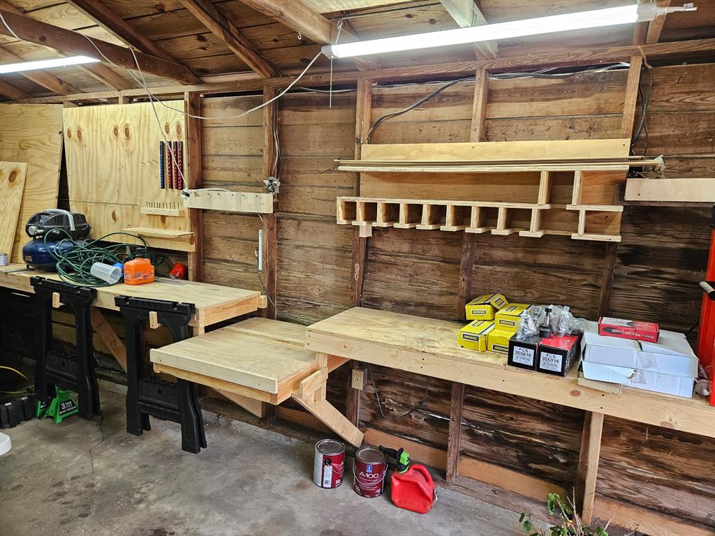 2802 Westover Road Shreveport, LA 71108 - Photo 27 of 33 a utility room with stainless steel appliances and toys