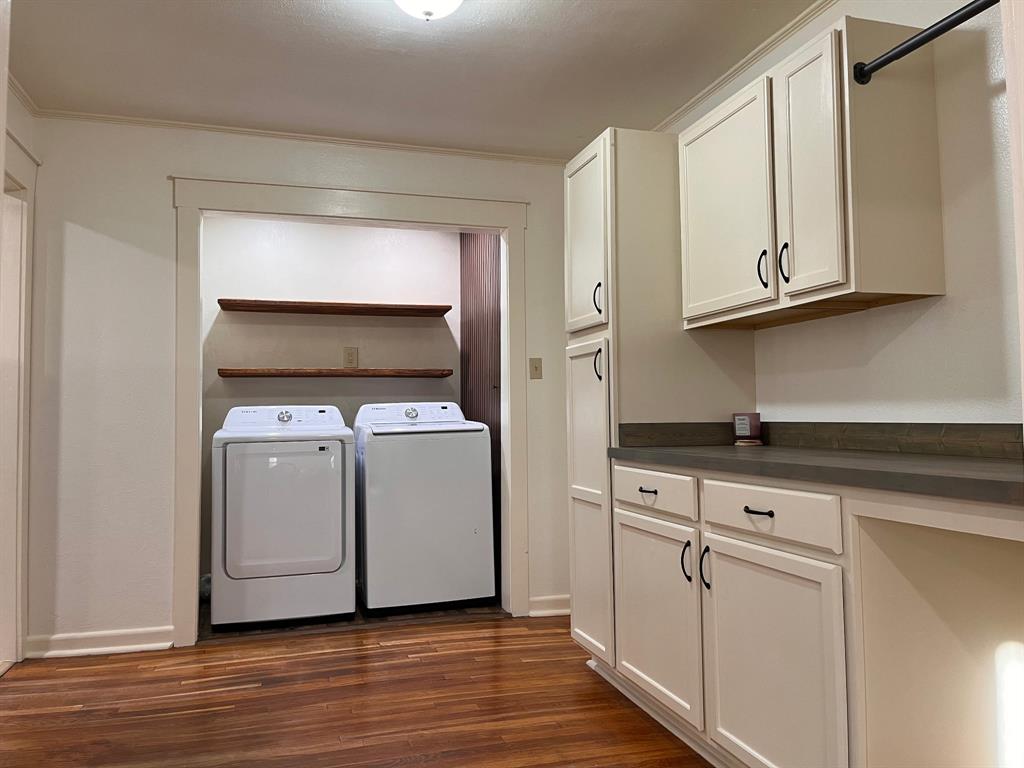 2802 Westover Road Shreveport, LA 71108 - Photo 33 of 33 a view of a kitchen with cabinets and wooden floor