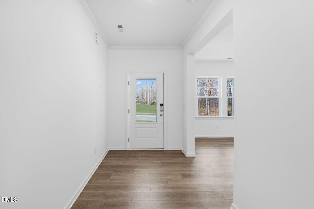 1208 Condor Jct Road Wendell, NC 27591 - Photo 24 of 57 a view of empty room with wooden floor