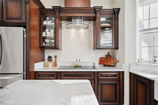 a kitchen with a sink and cabinets