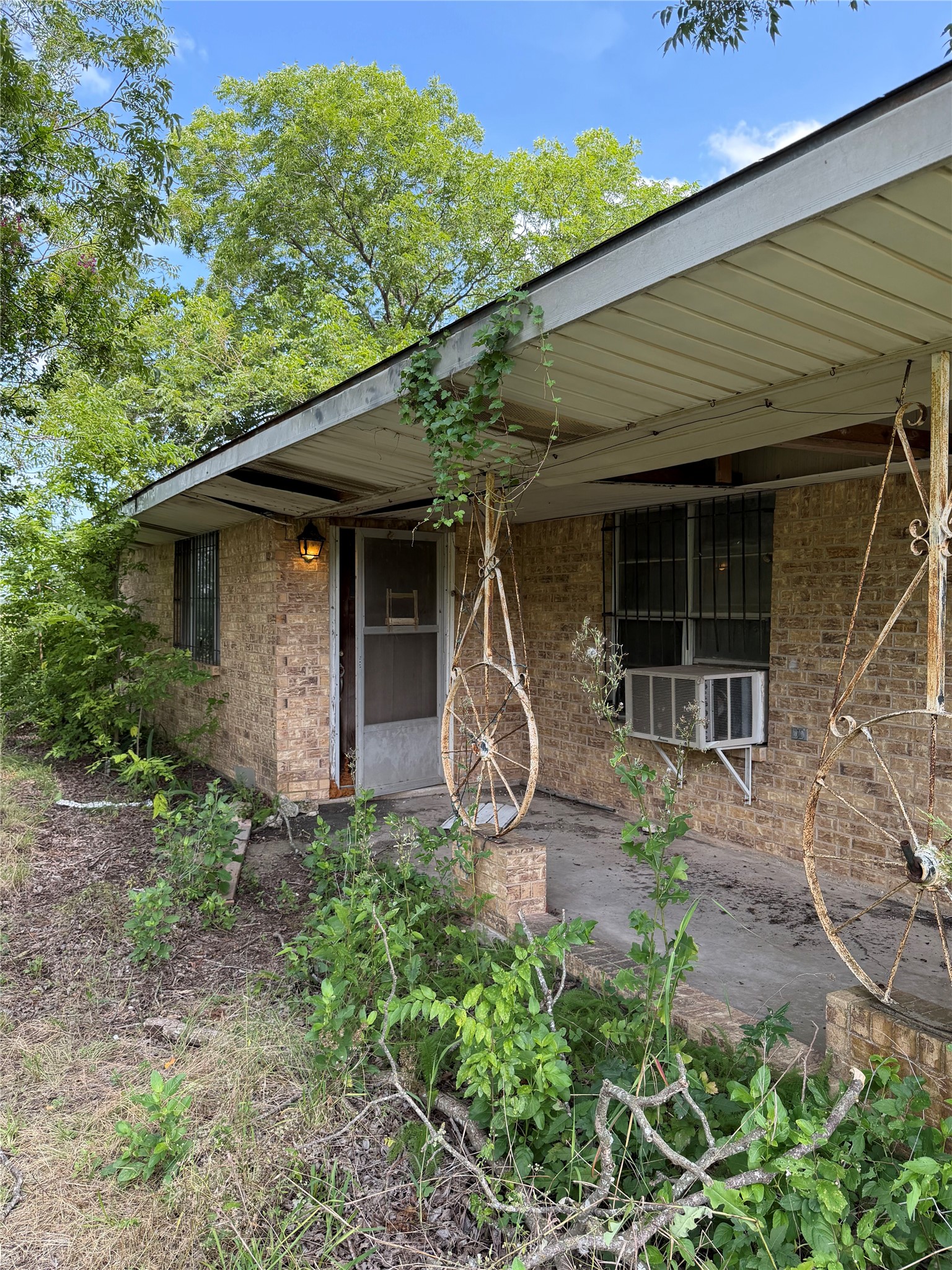 2501 Barnhardt Road Temple, TX 76502 - Photo 16 of 25 A classic brick exterior welcomes with a covered porch, offering a quiet place to unwind.