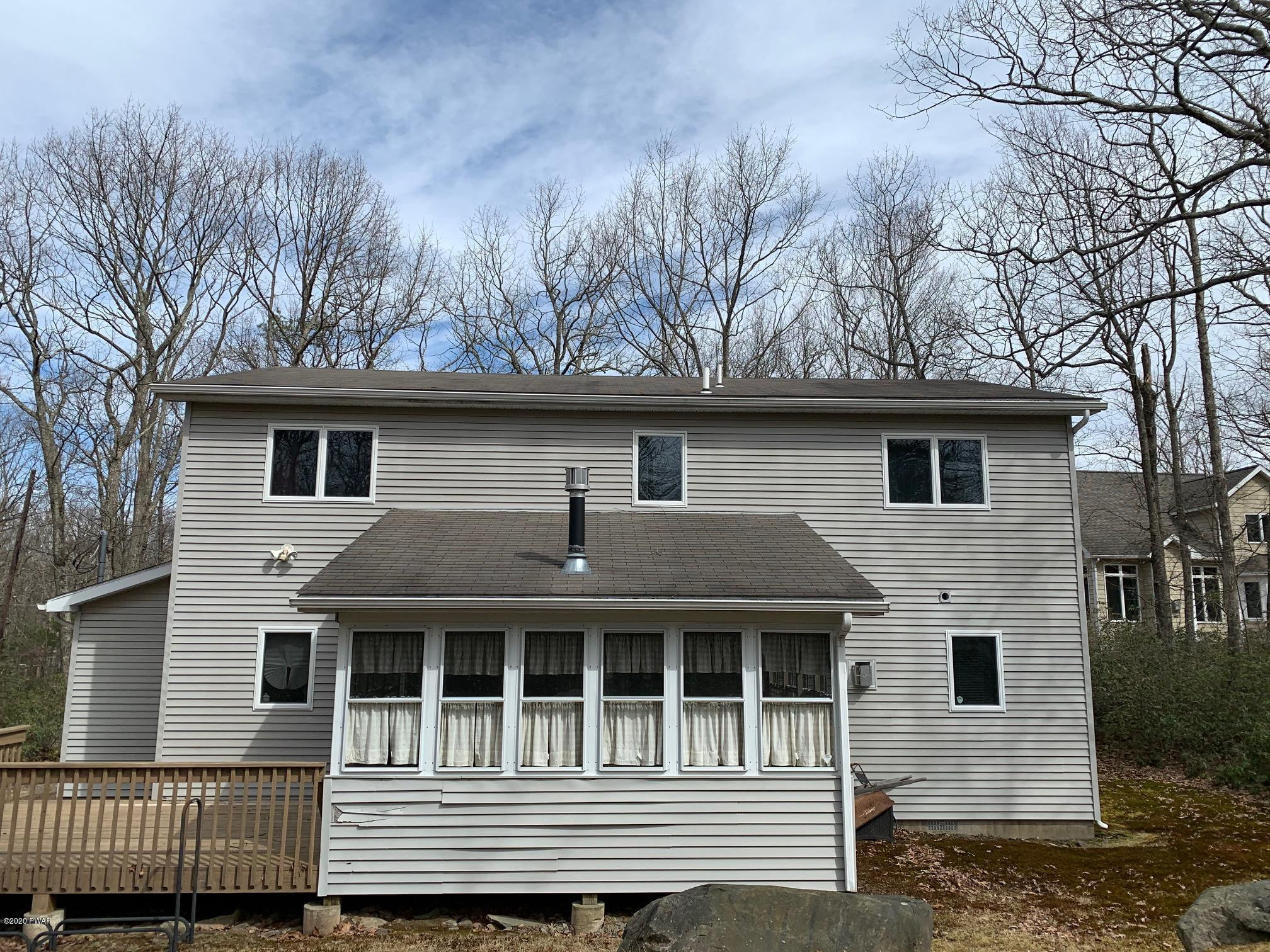 336 Maple Ridge Drive Hawley, PA 18428 - Photo 42 of 50 Back view of sunroom