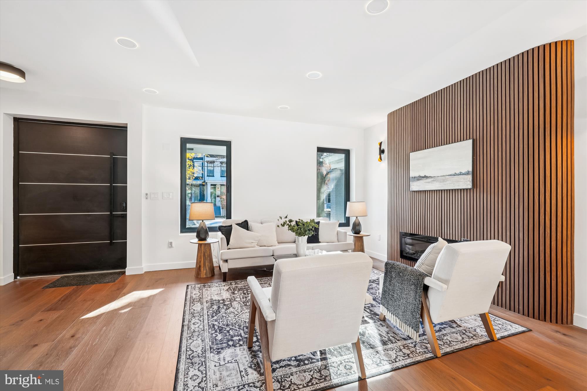 951 Shepherd Street Northwest Washington, DC 20011 - Photo 14 of 74 a living room with furniture a flat screen tv and closet