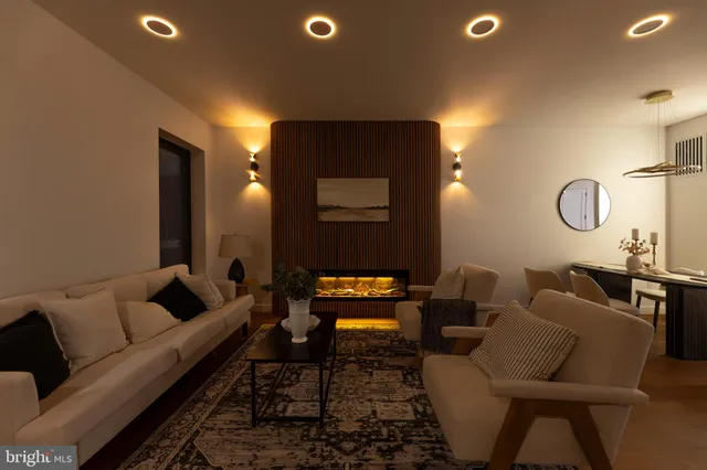 a view of a balcony with furniture and wooden floor