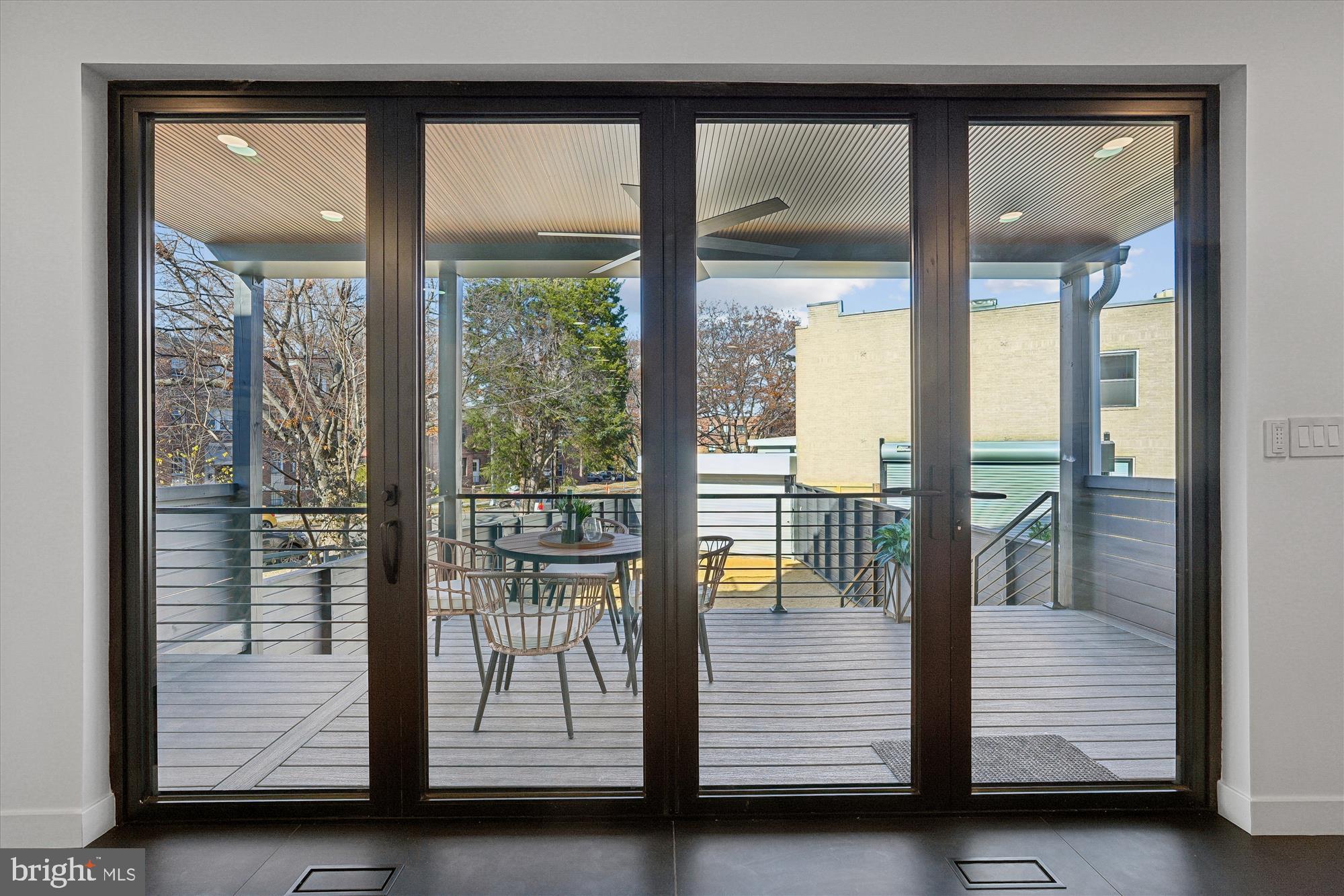 951 Shepherd Street Northwest Washington, DC 20011 - Photo 22 of 74 a view of room with balcony and glass door