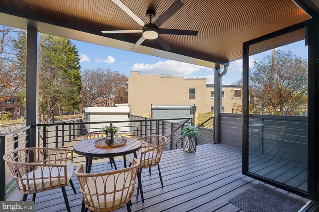 a bedroom with furniture and a wooden floor