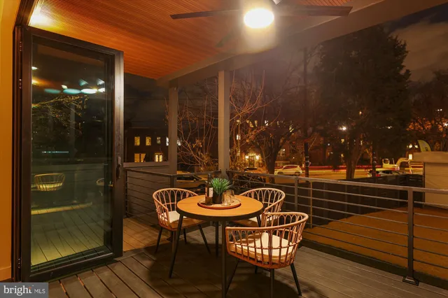 a bathroom with a double vanity sink a mirror and a bathtub