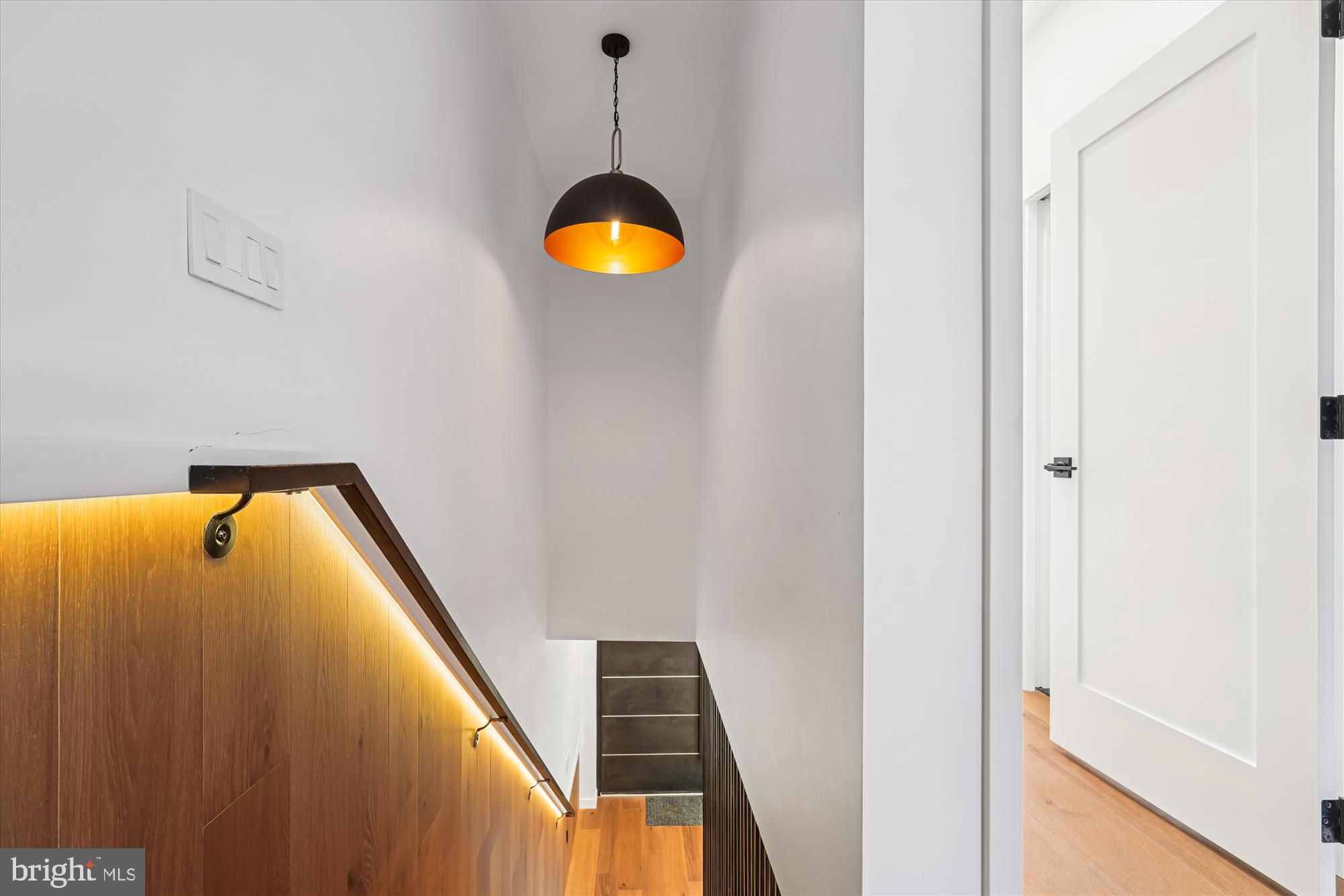 951 Shepherd Street Northwest Washington, DC 20011 - Photo 29 of 74 a view of a hallway with wooden floor and windows