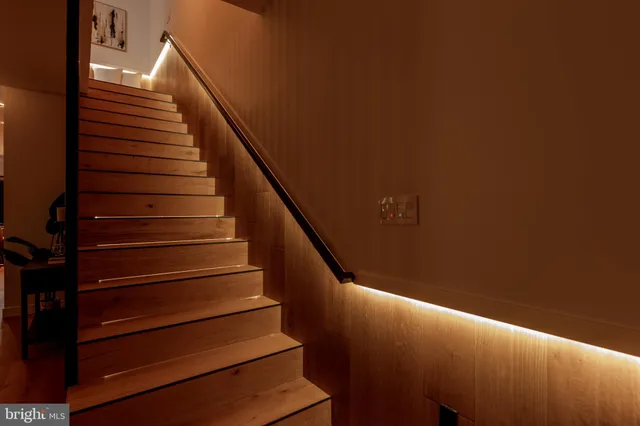 a bathroom with a shower and mirror