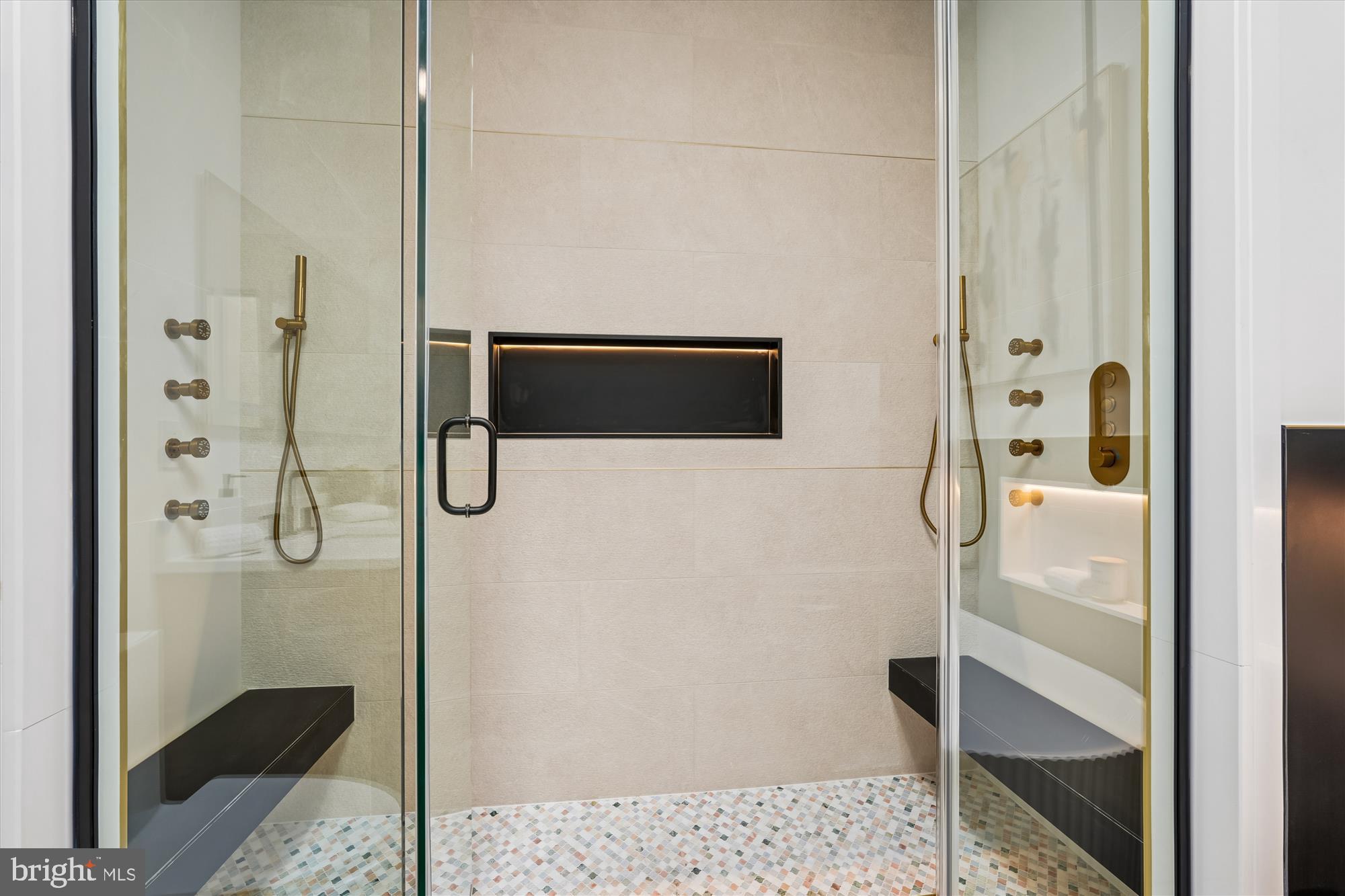 951 Shepherd Street Northwest Washington, DC 20011 - Photo 42 of 74 a bathroom with a shower and mirror