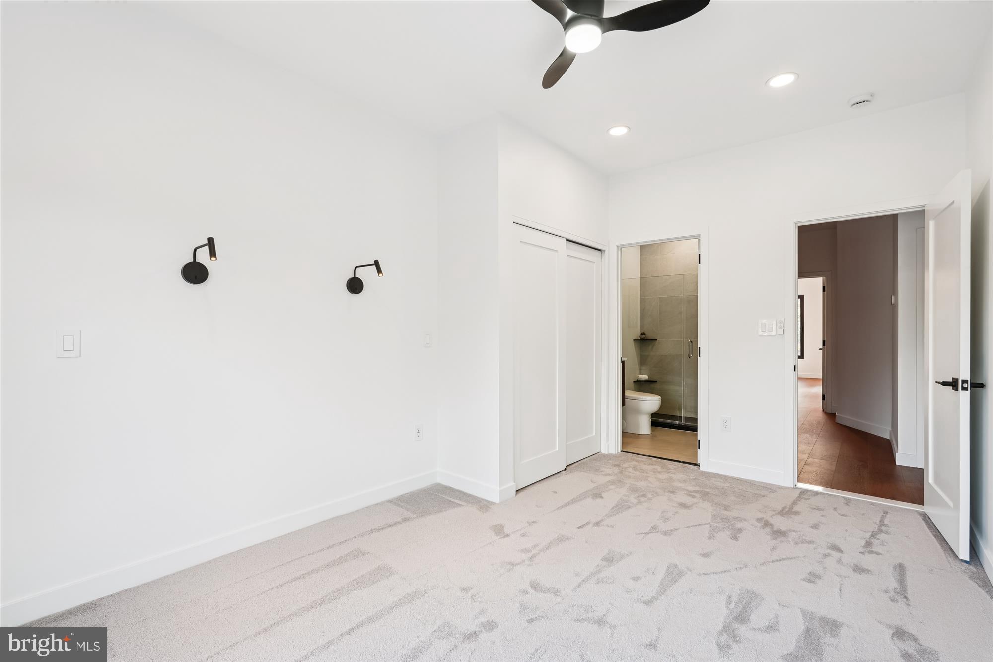 951 Shepherd Street Northwest Washington, DC 20011 - Photo 44 of 74 a view of a livingroom with a ceiling fan and window
