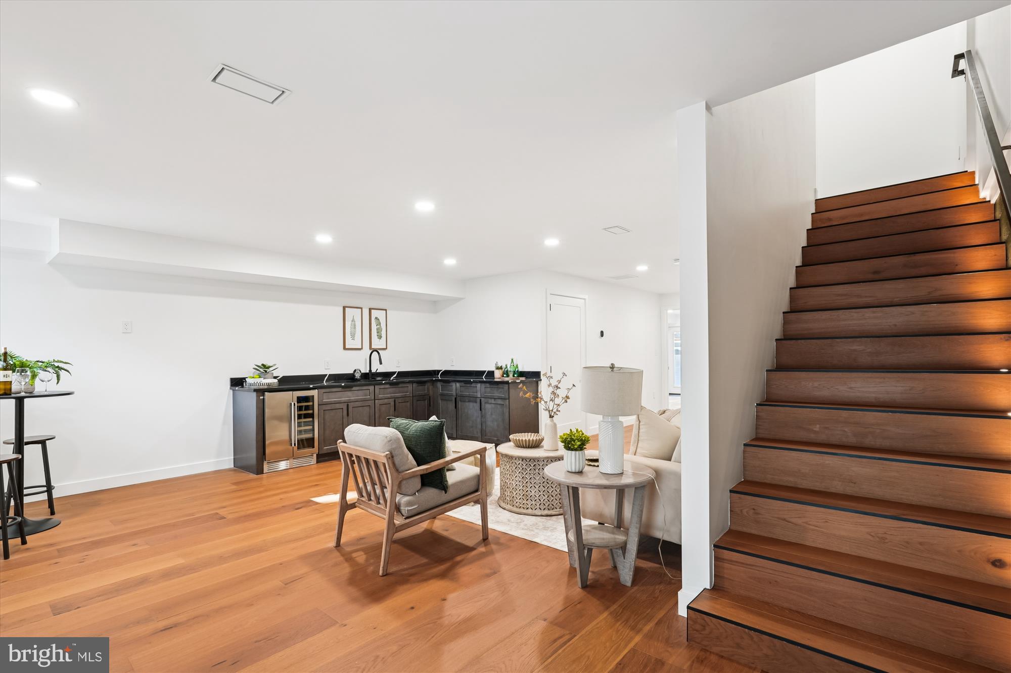 951 Shepherd Street Northwest Washington, DC 20011 - Photo 50 of 74 a living room with furniture and wooden floor