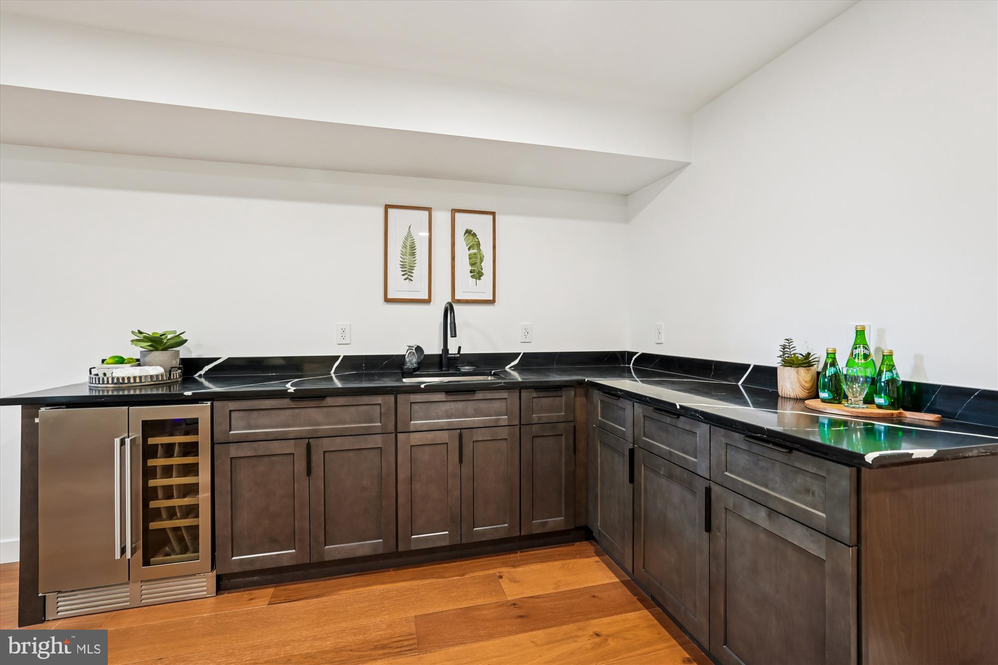 951 Shepherd Street Northwest Washington, DC 20011 - Photo 56 of 74 a kitchen with a sink and cabinets