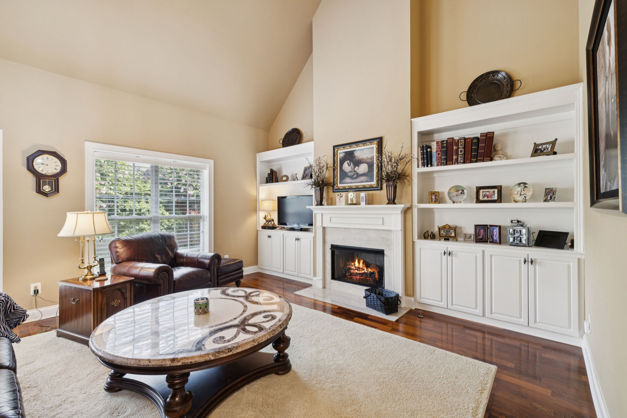 2999 Stewart Campbell Pointe Spring Hill, TN 37174 - Photo 13 of 50 a living room with furniture and a fireplace