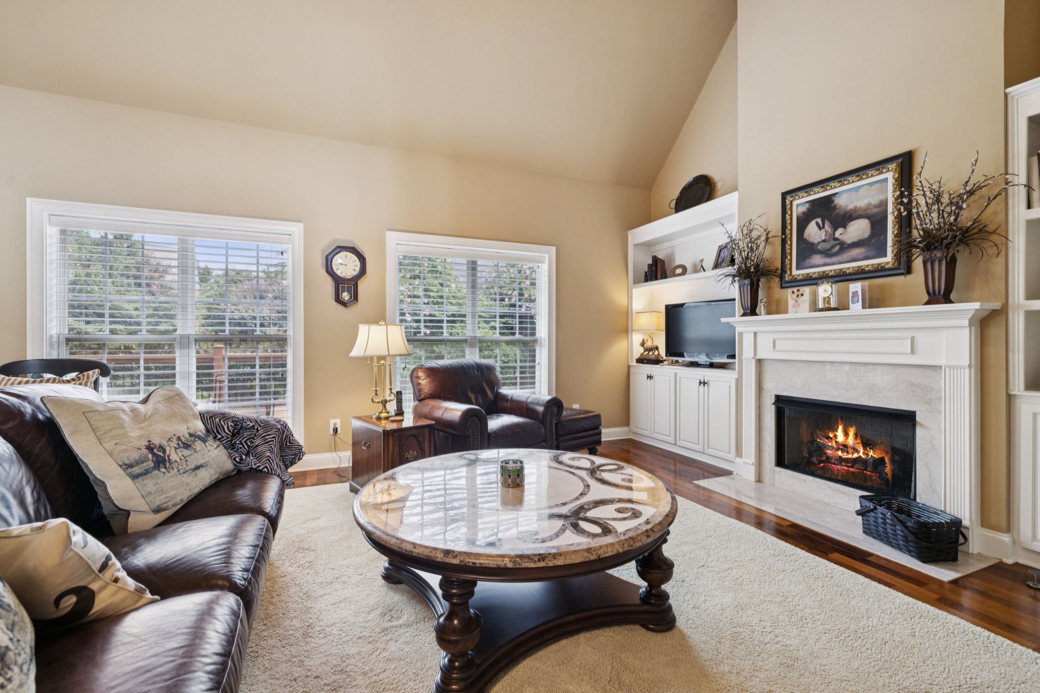 2999 Stewart Campbell Pointe Spring Hill, TN 37174 - Photo 17 of 50 a living room with furniture and a fireplace