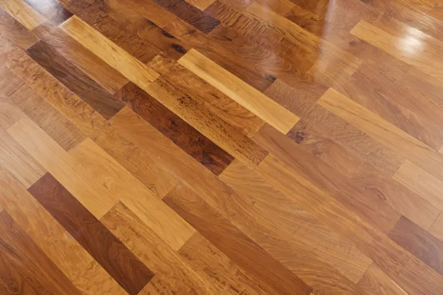 a dining room with furniture window wooden floor and a chandelier