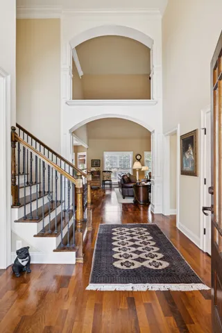 a view of livingroom and dining room with wooden floor