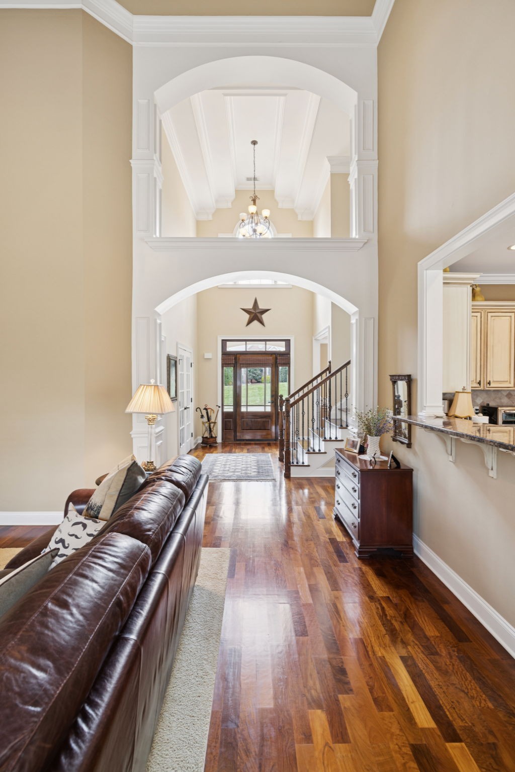 2999 Stewart Campbell Pointe Spring Hill, TN 37174 - Photo 4 of 50 a living room with furniture and a fireplace