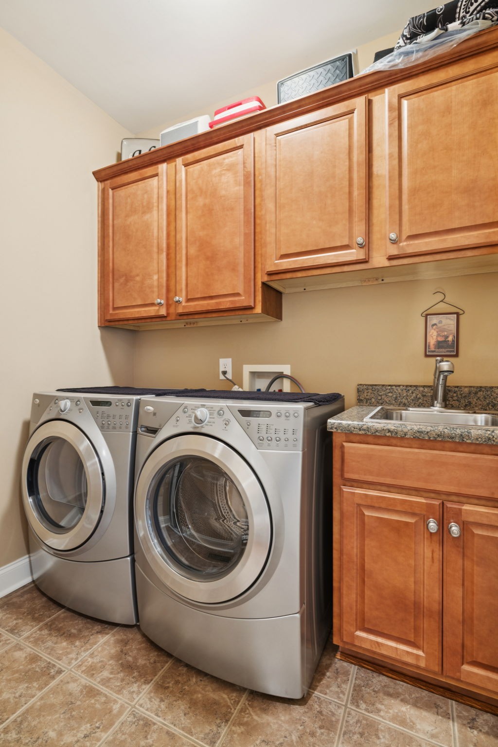 2999 Stewart Campbell Pointe Spring Hill, TN 37174 - Photo 48 of 50 a utility room with sink dryer and washer