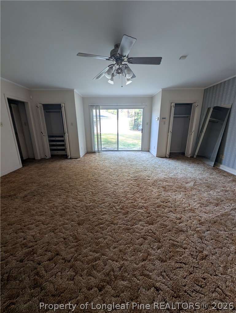 1503 Lakeview Road Fairmont, NC 28340 - Photo 13 of 30 an empty room with windows and closet