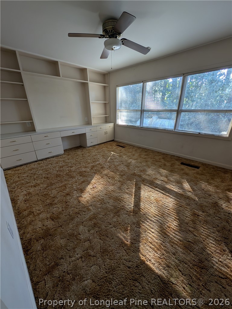 1503 Lakeview Road Fairmont, NC 28340 - Photo 23 of 30 a view of an empty room and window