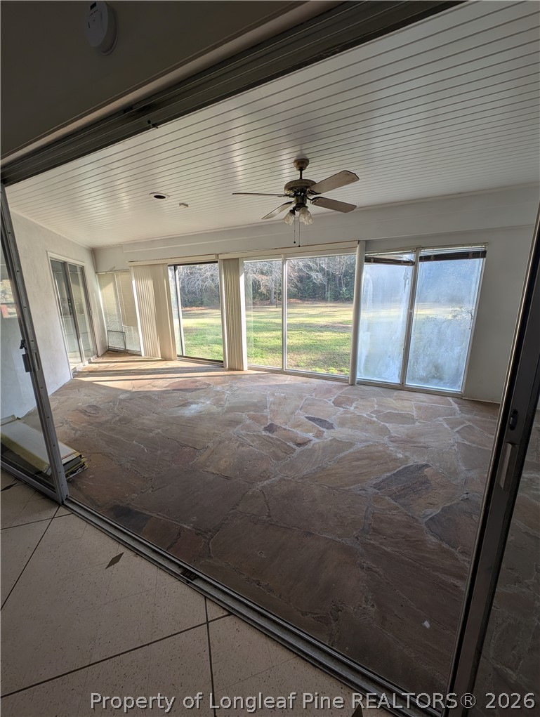 1503 Lakeview Road Fairmont, NC 28340 - Photo 6 of 30 a view of an empty room with a window