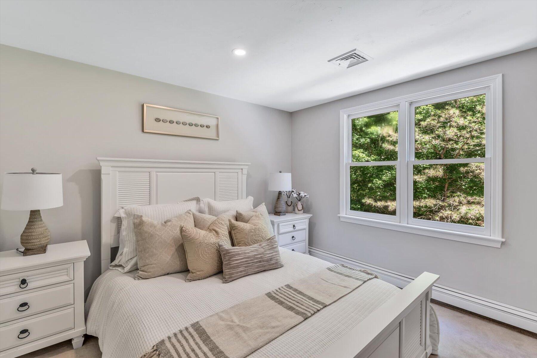 29 Fish House Road East Sandwich, MA 02537 - Photo 35 of 50 a bedroom with a bed and a window