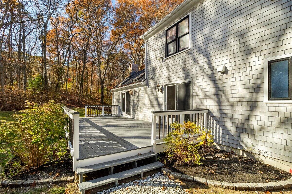 29 Fish House Road East Sandwich, MA 02537 - Photo 38 of 50 a view of a brick house with a yard