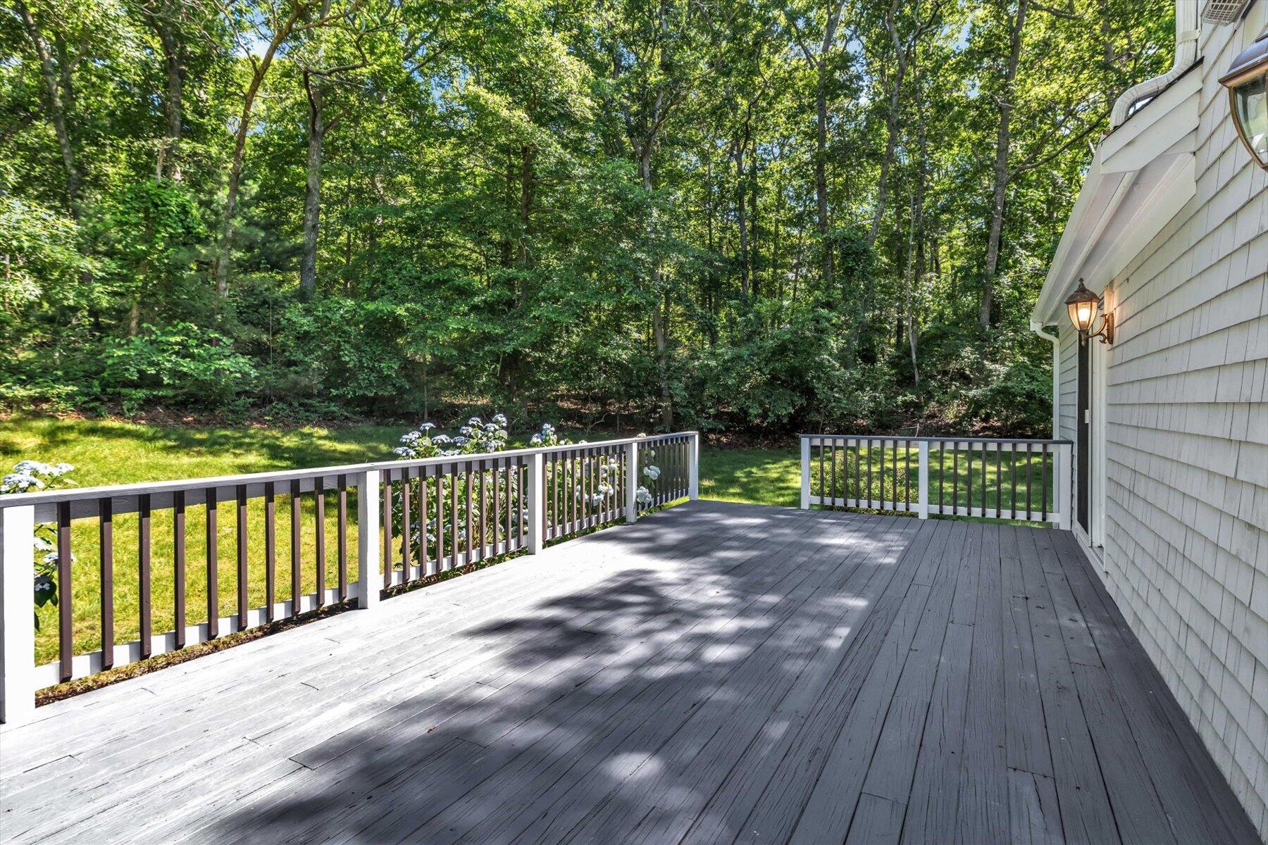 29 Fish House Road East Sandwich, MA 02537 - Photo 39 of 50 a view of a deck with wooden floor and fence