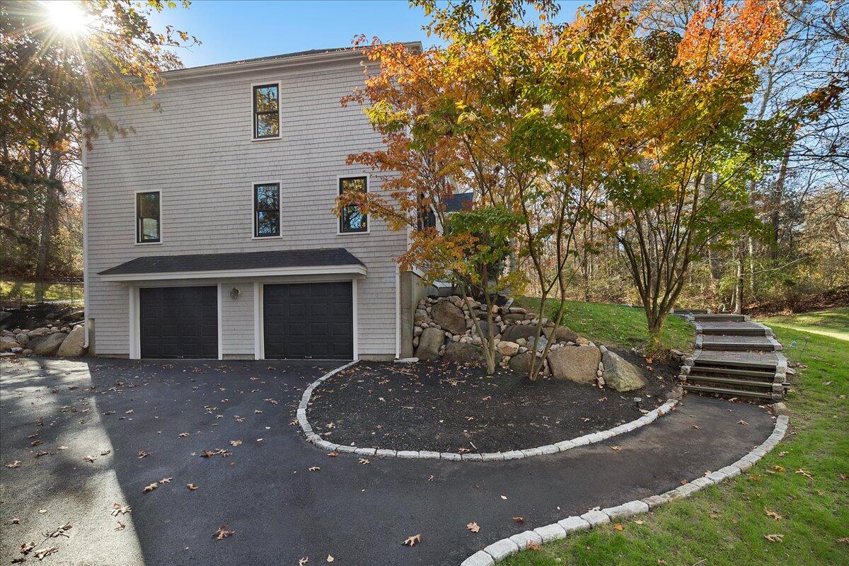 29 Fish House Road East Sandwich, MA 02537 - Photo 42 of 50 a view of a house with a yard