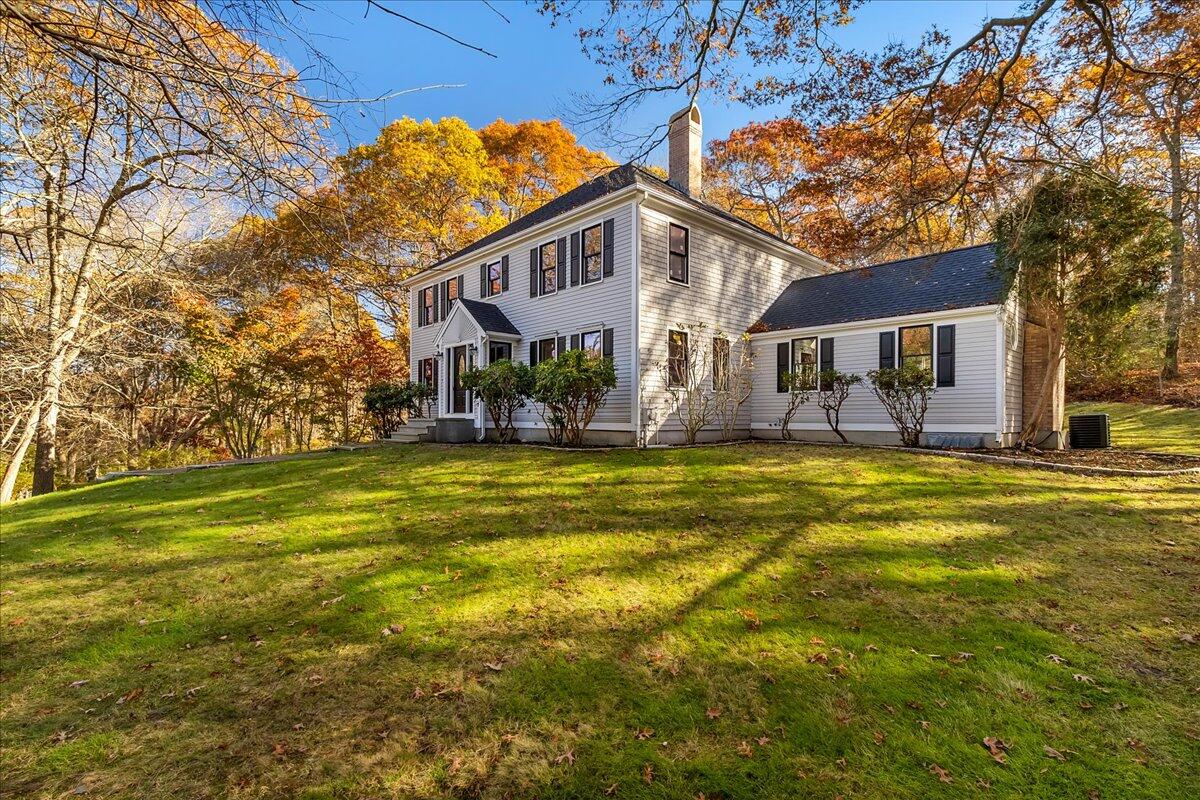 29 Fish House Road East Sandwich, MA 02537 - Photo 46 of 50 a front view of a house with swimming pool