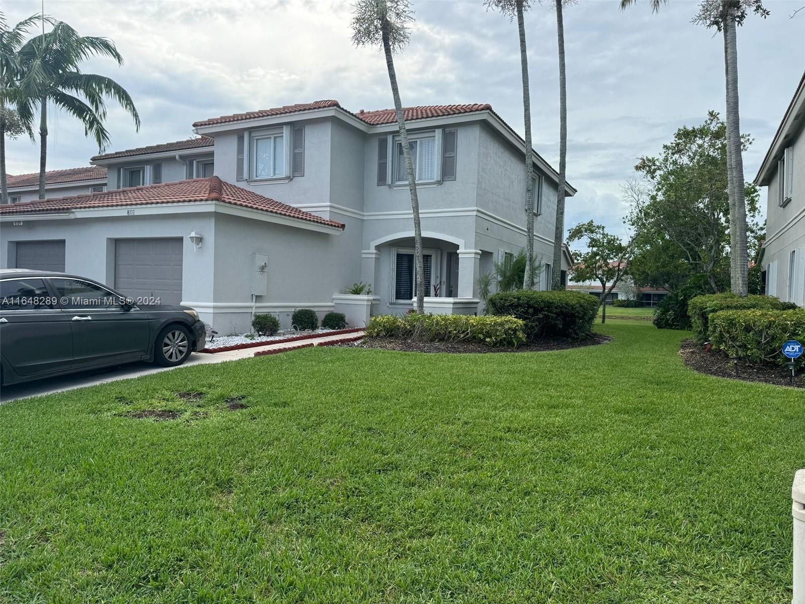 8111 Big Pine Way Riviera Beach, FL 33407 - Photo 1 of 26 FRONT OF STRUCTURE
