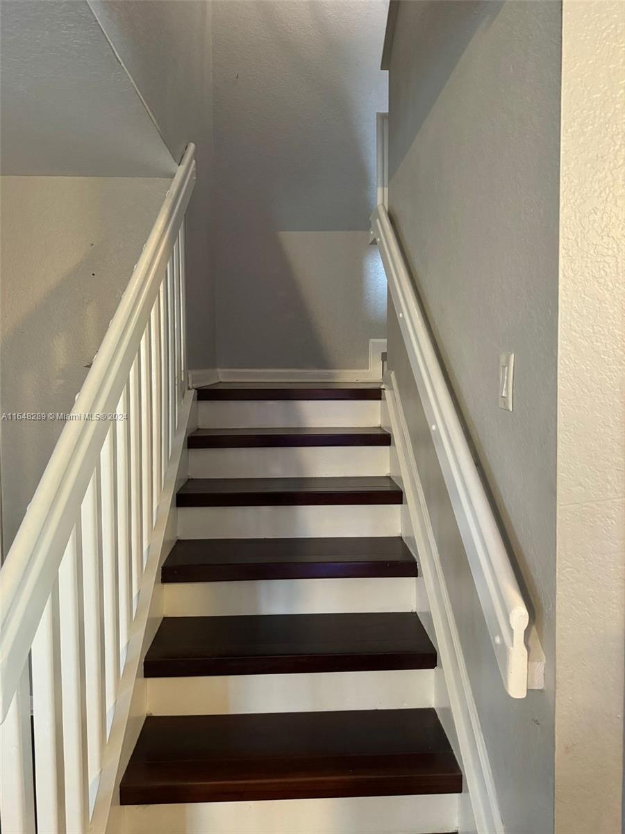 8111 Big Pine Way Riviera Beach, FL 33407 - Photo 17 of 26 STAIRWAY