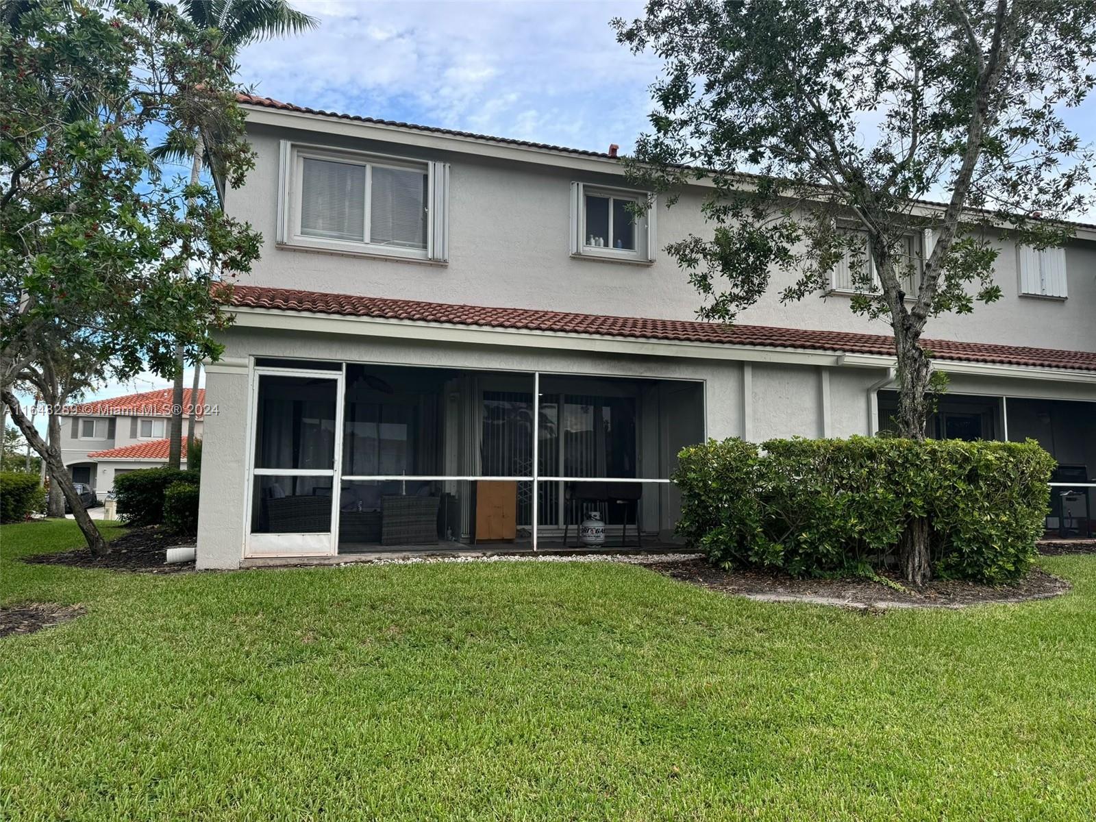 8111 Big Pine Way Riviera Beach, FL 33407 - Photo 3 of 26 BACK OF STRUCTURE