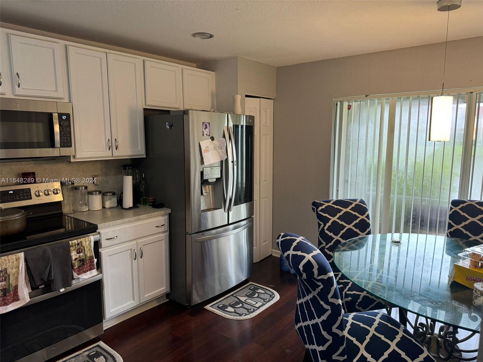 8111 Big Pine Way Riviera Beach, FL 33407 - Photo 9 of 26 KITCHEN