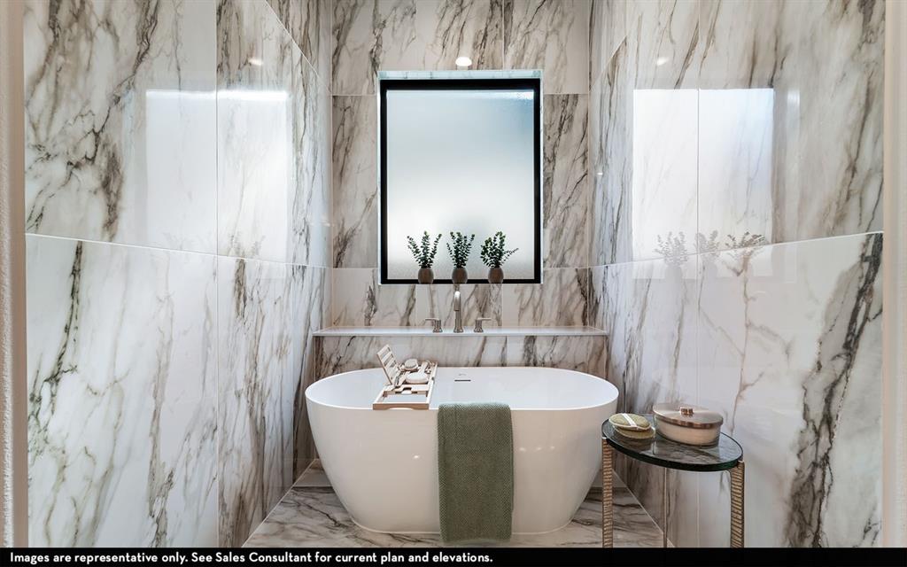 16301 Flatlands Way Celina, TX 75009 - Photo 30 of 39 a view of a bathtub in a bathroom