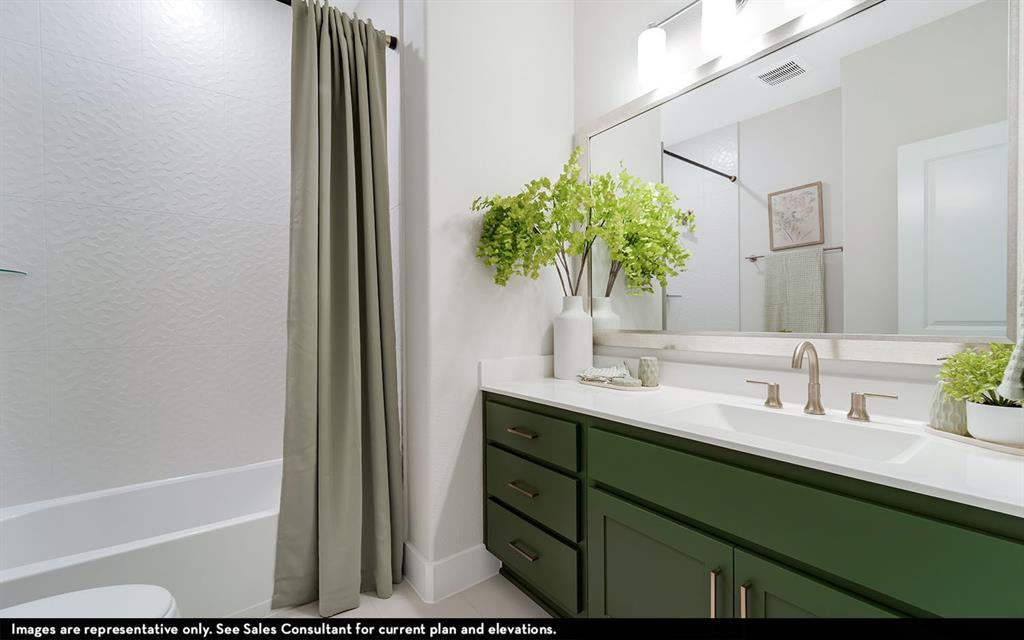 16301 Flatlands Way Celina, TX 75009 - Photo 35 of 39 a bathroom with a sink and a mirror