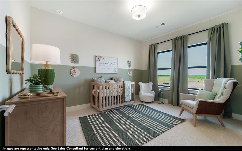 16301 Flatlands Way Celina, TX 75009 - Photo 39 of 39 a bedroom with furniture and wooden floor