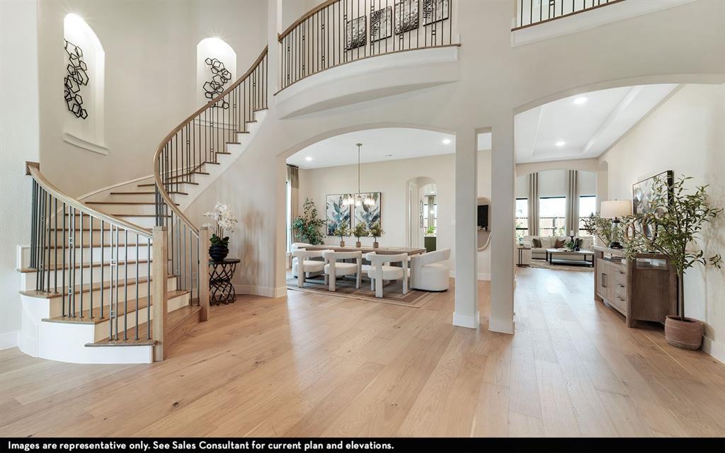 16301 Flatlands Way Celina, TX 75009 - Photo 4 of 39 a view of a livingroom with furniture and a living room
