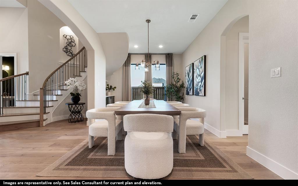 16301 Flatlands Way Celina, TX 75009 - Photo 6 of 39 a view of living room and dining room