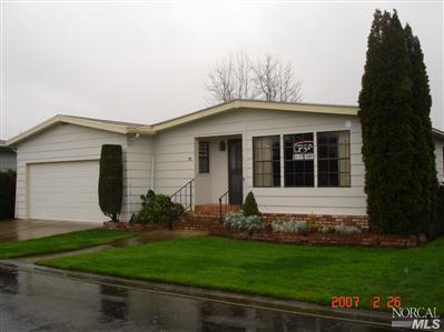 1945 Piner Road, Unit 72 Santa Rosa, CA 95403 - Photo 1 of 6 a front view of a house with garden