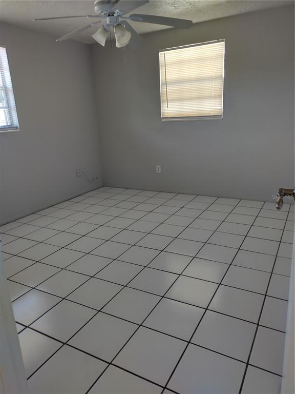 5112 Janice Lane Holiday, FL 34690 - Photo 8 of 10 a view of a room and window